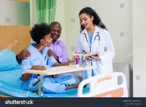 medcare vacances - stock photo black woman doctor and man patient black female doctor talking consulting and checkup by 2166975081